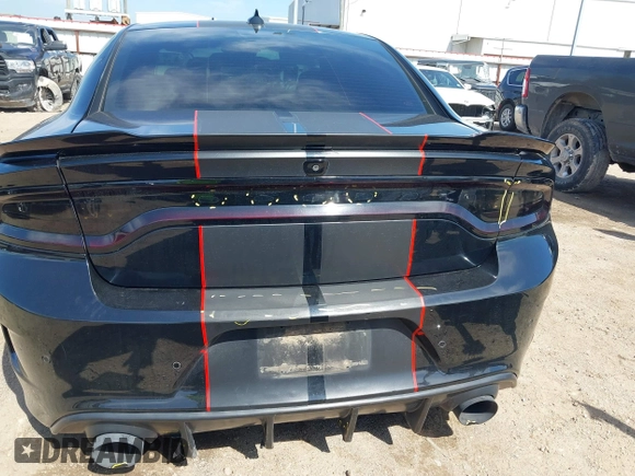 2019 Dodge Charger R/T with VIN 2C3CDXCT2KH575297, listed as a IAAI auction lot 41661339 with 119,854 mi miles and . Bid and sale history available at DreamBid. Image 18.