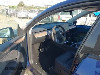 2023 Tesla Model Y Long Range with VIN 7SAYGDEE3PA114256, listed as a IAAI auction lot 42158307 with 19,975 mi miles and . Bid and sale history available at DreamBid. Image 5.