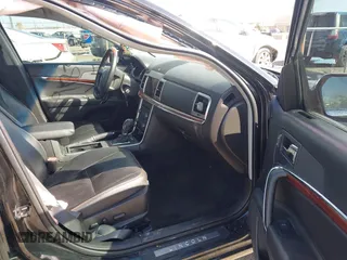 2012 Lincoln MKZ with VIN 3LNHL2JC4CR838515, listed as a IAAI auction lot 41879183 with 74,501 mi miles. Bid and sale history available at carsss.com. Image 5.