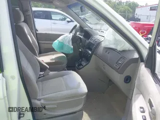 2005 Kia Sedona LX with VIN KNDUP132056702484, listed as a IAAI auction lot 42099572 with 195,528 mi miles and . Bid and sale history available at DreamBid. Image 5.