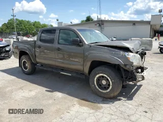 2011 Toyota Tacoma with VIN 3TMLU4EN6BM070132, listed as a Copart auction lot 56536564 with 185,256 mi miles and Salvage Title. Bid and sale history available at DreamBid. Image 4.