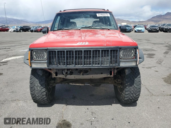 1996 Jeep Cherokee Sport with VIN 1J4FJ68S6TL213886, listed as a Copart auction lot 51462275 with 215,091 mi miles and Salvage title. Bid and sale history available at DreamBid. Image 5.
