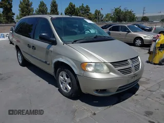 2005 Dodge Caravan SE with VIN 1D4GP24R05B305401, listed as a IAAI auction lot 42714397 with 333,318 mi miles and . Bid and sale history available at DreamBid. Image 1.