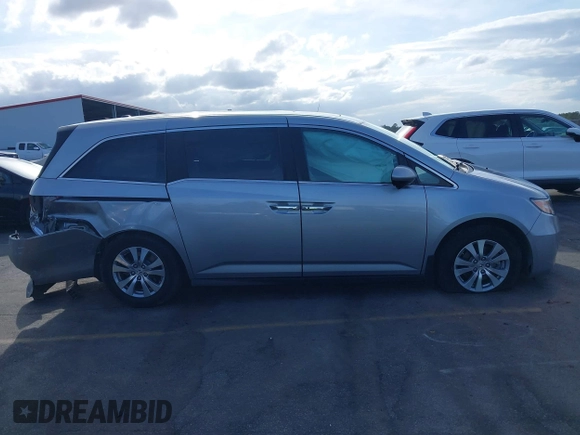 2017 Honda Odyssey EX-L with VIN 5FNRL5H64HB017661, listed as a IAAI auction lot 41719447 with 99,895 mi miles and . Bid and sale history available at DreamBid. Image 13.