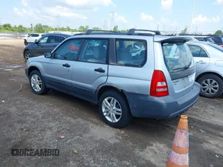 2004 Subaru Forester X with VIN JF1SG63664H736980, listed as a IAAI auction lot 42666843 with 154,405 mi miles and . Bid and sale history available at DreamBid. Image 3.