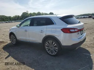 2016 Lincoln MKX Reserve with VIN 2LMTJ8LPXGBL38015, listed as a Copart auction lot 60981375 with 101,589 mi miles and Salvage title. Bid and sale history available at DreamBid. Image 2.