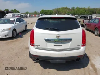 2012 Cadillac SRX Performance Collection z VIN 3GYFNBE39CS628740, wystawiony jako IAAI lot #42063414 z przebiegiem 88 260 mil mil oraz . Historia ofert i sprzedaży dostępna na DreamBid. Obrazek 16.
