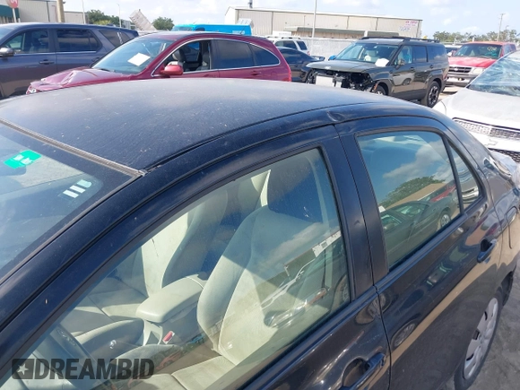 2010 Toyota Yaris with VIN JTDBT4K35A1365932, listed as a IAAI auction lot 42169944 with 248,292 mi miles and . Bid and sale history available at DreamBid. Image 12.