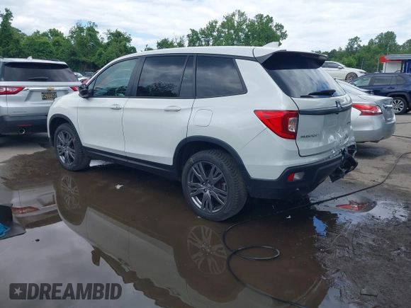 2021 Honda Passport EX-L with VIN 5FNYF8H54MB041738, listed as a IAAI auction lot 42310470 with 52,409 mi miles and . Bid and sale history available at DreamBid. Image 3.