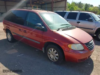 2006 Chrysler Town & Country SWB with VIN 1A4GP45R76B572053, listed as a IAAI auction lot 42015562 with 310,509 mi miles. Bid and sale history available at carsss.com. Image 1.