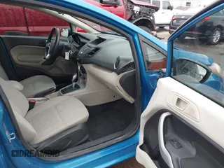 2016 Ford Fiesta SE with VIN 3FADP4BJXGM156859, listed as a IAAI auction lot 42119154 with 74,157 mi miles and . Bid and sale history available at DreamBid. Image 5.