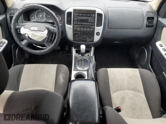2007 Mercury Mariner Luxury with VIN 4M2YU91107KJ07772, listed as a Copart auction lot 42867545 with 128,235 mi miles and Salvage title. Bid and sale history available at DreamBid. Image 8.