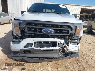 2022 Ford F-150 XL z VIN 1FTEW1EP6NKD68369, wystawiony jako IAAI lot #41985108 z przebiegiem 58 464 mil mil oraz . Historia ofert i sprzedaży dostępna na DreamBid. Obrazek 6.