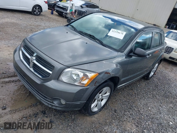 2011 Dodge Caliber Mainstreet z VIN 1B3CB3HA8BD254252, wystawiony jako IAAI lot #42239670 z przebiegiem 171 033 mil mil oraz . Historia ofert i sprzedaży dostępna na DreamBid. Obrazek 2.