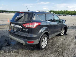 2015 Ford Escape Titanium with VIN 1FMCU0J96FUC59510, listed as a Copart auction lot 57091765 with 120,586 mi miles and Salvage title. Bid and sale history available at DreamBid. Image 3.