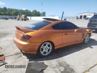 2006 Hyundai Tiburon GT z VIN KMHHN65F66U191134, wystawiony jako Copart lot #56692615 z przebiegiem 197 093 mil mil oraz Szkoda całkowita • Salvage title. Historia ofert i sprzedaży dostępna na DreamBid. Obrazek 3.
