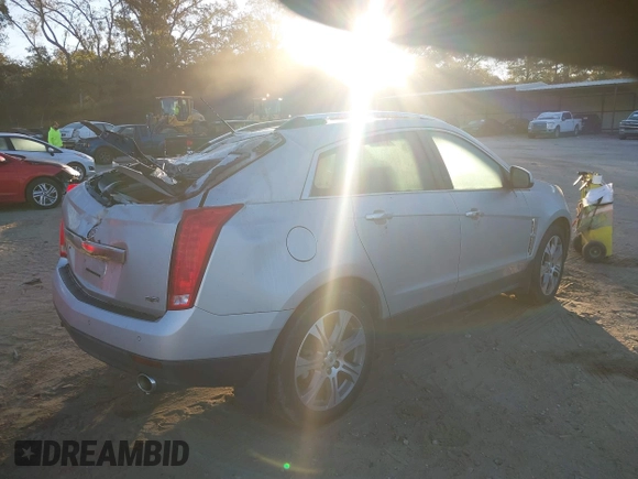 2012 Cadillac SRX Premium Collection with VIN 3GYFNFE36CS509048, listed as a IAAI auction lot 40636427 with 104,001 mi miles. Bid and sale history available at carsss.com. Image 4.