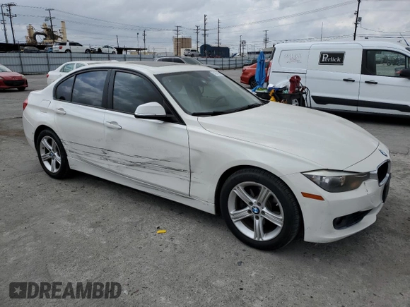 2015 BMW 3 Series 328i with VIN WBA3C1C55FK120405, listed as a Copart auction lot 54374035 with 121,411 mi miles and Salvage title. Bid and sale history available at DreamBid. Image 4.