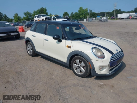 2015 MINI Hardtop 4 Door with VIN WMWXS5C5XFT827330, listed as a IAAI auction lot 42402965 with 140,648 mi miles and . Bid and sale history available at DreamBid. Image 1.