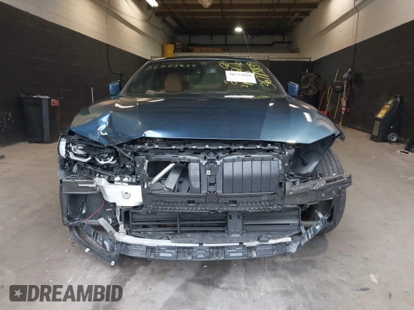 2022 BMW 4 Series 430i xDrive with VIN WBA73AP05NCJ87742, listed as a IAAI auction lot 36773839 with 20,814 mi miles and . Bid and sale history available at DreamBid. Image 6.
