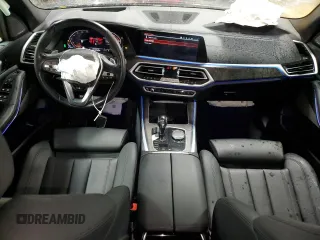 2021 BMW X5 xDrive40i with VIN 5UXCR6C00M9G00599, listed as a Copart auction lot 51536795 with 55,422 mi miles and Salvage title. Bid and sale history available at DreamBid. Image 8.