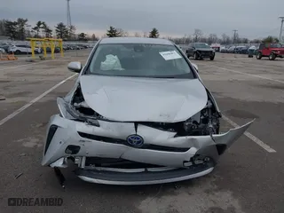 2022 Toyota Prius L Eco with VIN JTDKAMFU5N3189161, listed as a IAAI auction lot 41666463 with 41,398 mi miles. Bid and sale history available at carsss.com. Image 6.