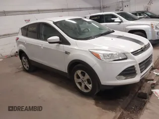 2013 Ford Escape SE with VIN 1FMCU0GX5DUA74237, listed as a IAAI auction lot 42447048 with 140,732 mi miles and . Bid and sale history available at DreamBid. Image 1.