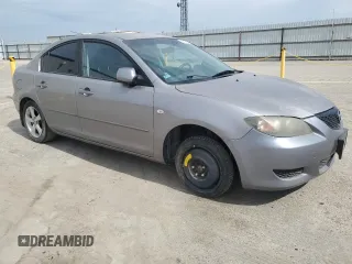 2006 Mazda 3 i with VIN JM1BK12F861415998, listed as a Copart auction lot 48617885 with 252,508 mi miles and Clean Title. Bid and sale history available at DreamBid. Image 4.