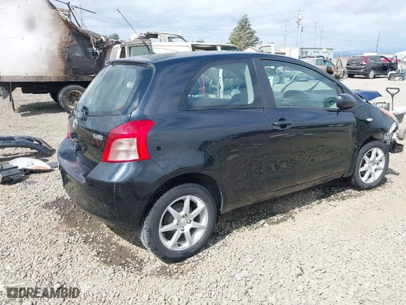 2007 Toyota Yaris with VIN JTDJT923975105026, listed as a IAAI auction lot 40091976 with 127,406 mi miles. Bid and sale history available at carsss.com. Image 4.