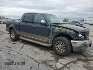 2001 Ford F-150 XLT with VIN 1FTRW07LX1KA18940, listed as a Copart auction lot 50723495 with 133,686 mi miles and Salvage title. Bid and sale history available at DreamBid. Image 4.
