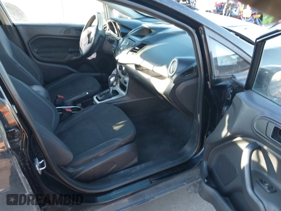 2017 Ford Fiesta SE z VIN 3FADP4BJ6HM125903, wystawiony jako IAAI lot #41376018 z przebiegiem 114 628 mil mil oraz . Historia ofert i sprzedaży dostępna na DreamBid. Obrazek 5.