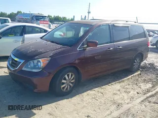 2009 Honda Odyssey EX-L with VIN 5FNRL38699B402476, listed as a IAAI auction lot 42146268 with 189,106 mi miles. Bid and sale history available at carsss.com. Image 2.