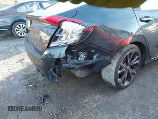 2019 Honda Civic Sport with VIN 2HGFC2F84KH514704, listed as a IAAI auction lot 41225362 with 43,111 mi miles and . Bid and sale history available at DreamBid. Image 6.