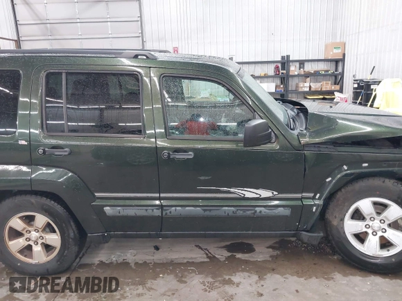 2010 Jeep Liberty Sport with VIN 1J4PN2GKXAW166781, listed as a IAAI auction lot 42301262 with 117,798 mi miles and . Bid and sale history available at DreamBid. Image 14.