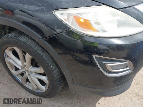 2011 Mazda CX-9 Grand Touring with VIN JM3TB2DA7B0304023, listed as a IAAI auction lot 41950829 with 135,858 mi miles. Bid and sale history available at carsss.com. Image 13.