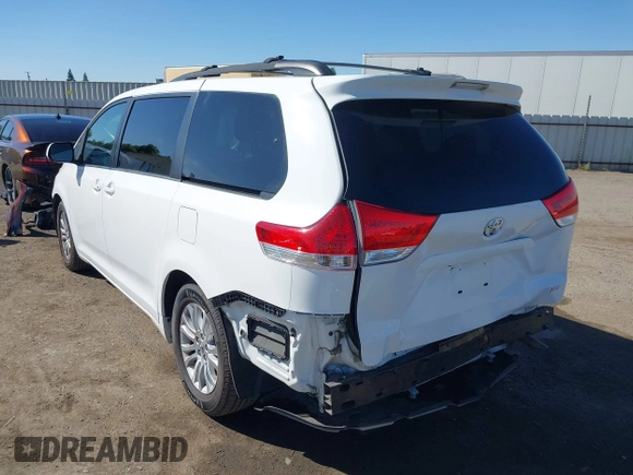 2012 Toyota Sienna XLE AAS with VIN 5TDYK3DC6CS240285, listed as a IAAI auction lot 42778248 with 122,091 mi miles and . Bid and sale history available at DreamBid. Image 3.