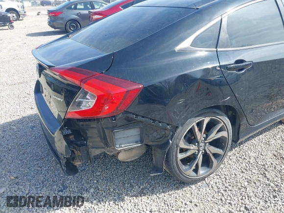 2019 Honda Civic Sport with VIN 19XFC2F86KE045495, listed as a IAAI auction lot 42074631 with 52,864 mi miles and . Bid and sale history available at DreamBid. Image 6.