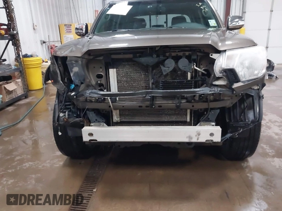2014 Toyota Tacoma PreRunner with VIN 3TMJU4GNXEM164507, listed as a IAAI auction lot 42118984 with 183,101 mi miles and . Bid and sale history available at DreamBid. Image 6.