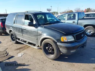 1999 Ford Expedition XLT z VIN 1FMRU1760XLB99695, wystawiony jako IAAI lot #41396676 z przebiegiem 214 434 mil mil oraz . Historia ofert i sprzedaży dostępna na DreamBid. Obrazek 1.