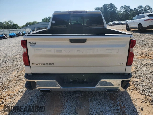 2019 Chevrolet Silverado 1500 LTZ with VIN 3GCUYGED5KG125542, listed as a Copart auction lot 53467455 with 92,053 mi miles and Salvage Title. Bid and sale history available at DreamBid. Image 6.