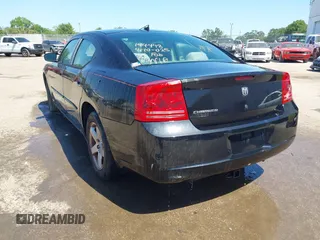 2008 Dodge Charger with VIN 2B3KA43R58H144448, listed as a IAAI auction lot 42015594 with 199,886 mi miles and . Bid and sale history available at carsss.com. Image 3.