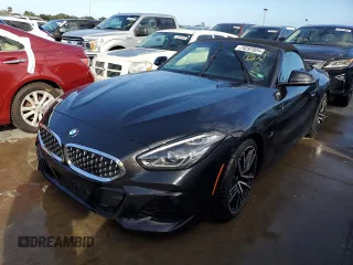 2020 BMW Z4 sDrive30i with VIN WBAHF3C06LWW75400, listed as a Copart auction lot 74297024 with 34,559 mi miles and Salvage Title. Bid and sale history available at carsss.com. Image 1.