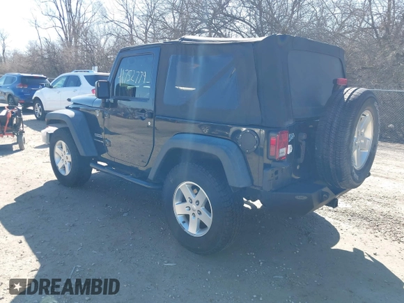 2014 Jeep Wrangler Sport with VIN 1C4AJWAGXEL319749, listed as a IAAI auction lot 41752779 with 140,045 mi miles and . Bid and sale history available at DreamBid. Image 3.