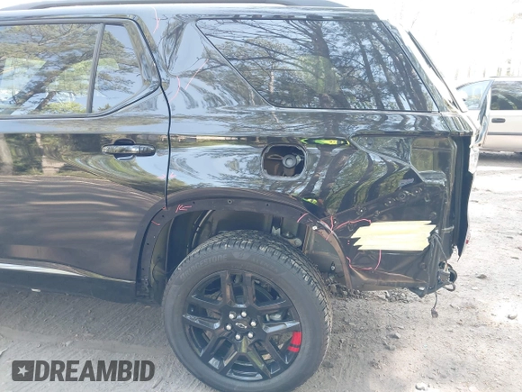 2023 Chevrolet Traverse Premier with VIN 1GNERKKW8PJ334863, listed as a IAAI auction lot 42060557 with 24,108 mi miles and . Bid and sale history available at DreamBid. Image 18.