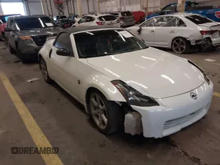 2005 Nissan 350Z Touring with VIN JN1AZ36A45M754923, listed as a IAAI auction lot 41720671 with 124,916 mi miles. Bid and sale history available at carsss.com. Image 1.