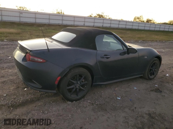 2021 Mazda MX-5 Miata Sport with VIN JM1NDAB79M0454876, listed as a Copart auction lot 82086434 with 74,035 mi miles and Salvage title. Bid and sale history available at DreamBid. Image 3.
