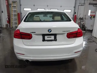 2018 BMW 3 Series 320i xDrive with VIN WBA8E5G56JNU47338, listed as a IAAI auction lot 41238204 with 54,596 mi miles. Bid and sale history available at carsss.com. Image 16.