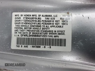 2011 Honda Odyssey Touring with VIN 5FNRL5H99BB021223, listed as a Copart auction lot 61171775 with 194,029 mi miles and Salvage title. Bid and sale history available at DreamBid. Image 14.