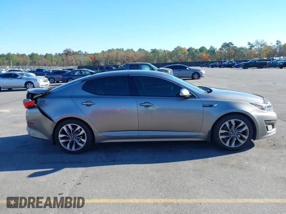 2015 Kia Optima SX Turbo with VIN 5XXGR4A66FG382167, listed as a IAAI auction lot 40951399 with 77,083 mi miles and . Bid and sale history available at DreamBid. Image 13.