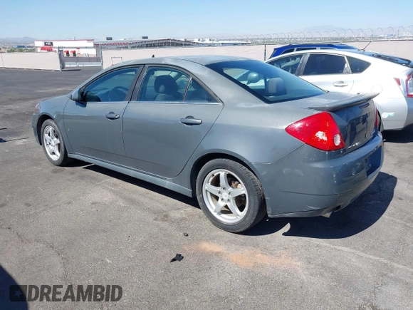 2009 Pontiac G6 GT 1SB z VIN 1G2ZK57K594234408, wystawiony jako IAAI lot #42547870 z przebiegiem 206 547 mil mil oraz . Historia ofert i sprzedaży dostępna na DreamBid. Obrazek 3.
